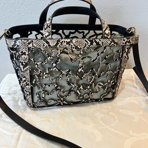 Tous basket handbag in pristine condition.